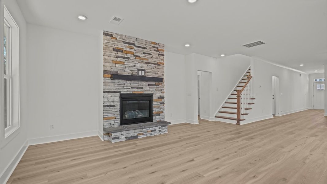 First-rate living space with tasteful hardwood floors and a functional open-concept design