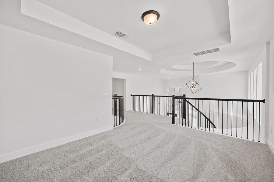 Spacious, unfurnished interior of a new home in The Colony, Bastrop (Image 37).