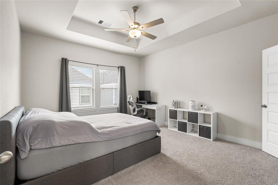 Beyond accommodating a full bedroom suite, the expansive primary offers the flexibility to incorporate a home office, reading nook, fitness area, or additional storage without compromising comfort.
