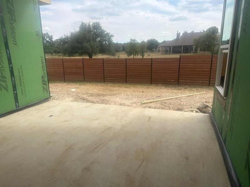 Fenced backyard featuring a patio Fenced backyard featuring a patio