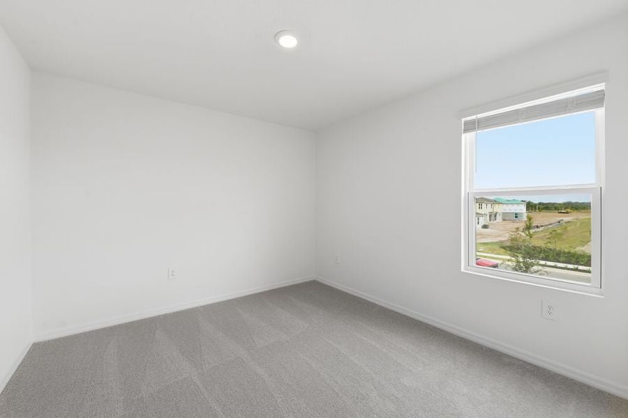 Representative unfurnished interior of a home built from the Redbud by Taylor Morrison in Firethorn, Parrish (Image 14).