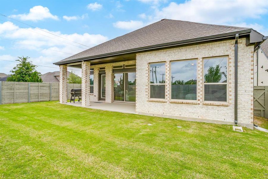Exterior details and patio area of a home in , Argyle (Image 23).