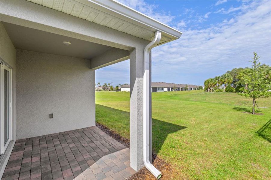 Exterior details and patio area of a home in , North Port (Image 25).