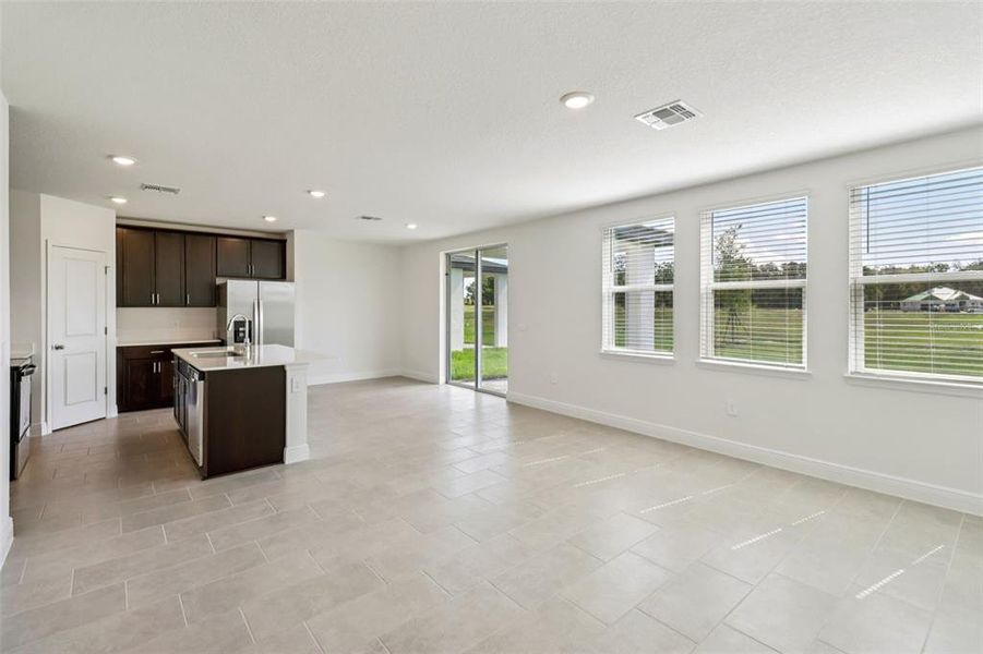 Spacious, unfurnished interior of a new home in The Reserve at Hammock Oaks - Classic Series, Lady Lake (Image 16).