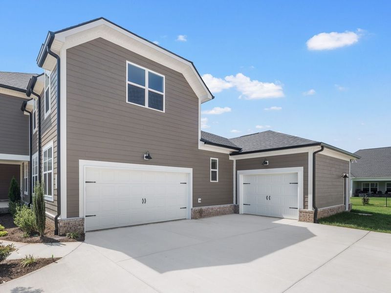 Front exterior of a new home in Shelton Square, Murfreesboro, TN, highlighting curb appeal (Image 31). Front exterior of a new home in Shelton Square, Murfreesboro, TN, highlighting curb appeal (Image 31).