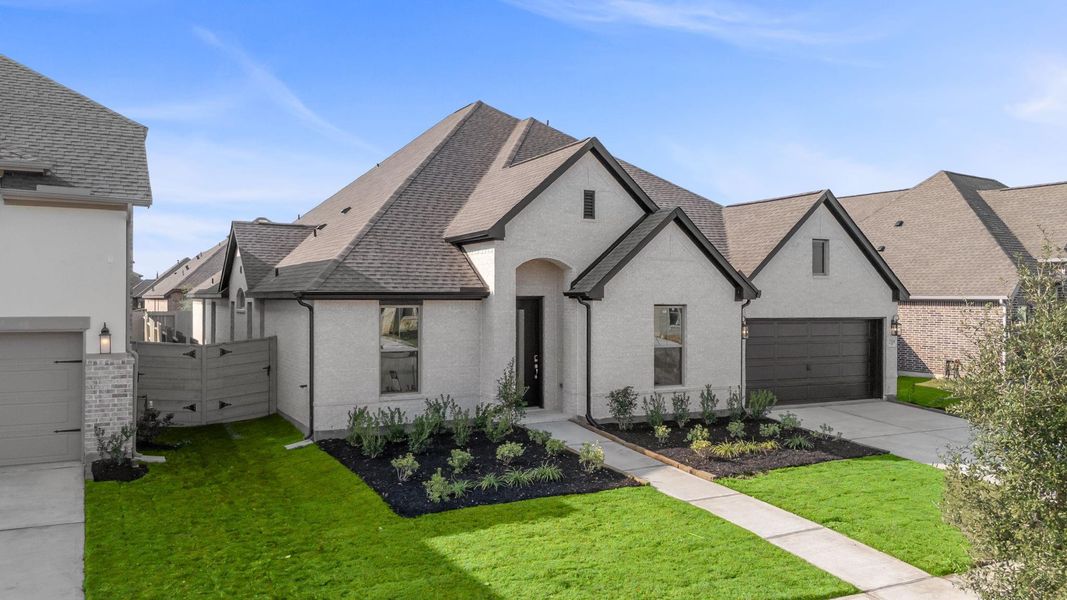 Front exterior of a new home in Pomona, Manvel, TX, highlighting curb appeal (Image 20).