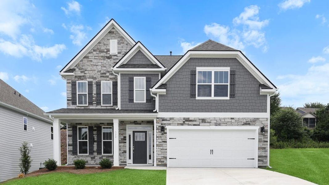 Front exterior of a new home in Sunset Summits, Spartanburg, SC, highlighting curb appeal (Image 1). Front exterior of a new home in Sunset Summits, Spartanburg, SC, highlighting curb appeal (Image 1).