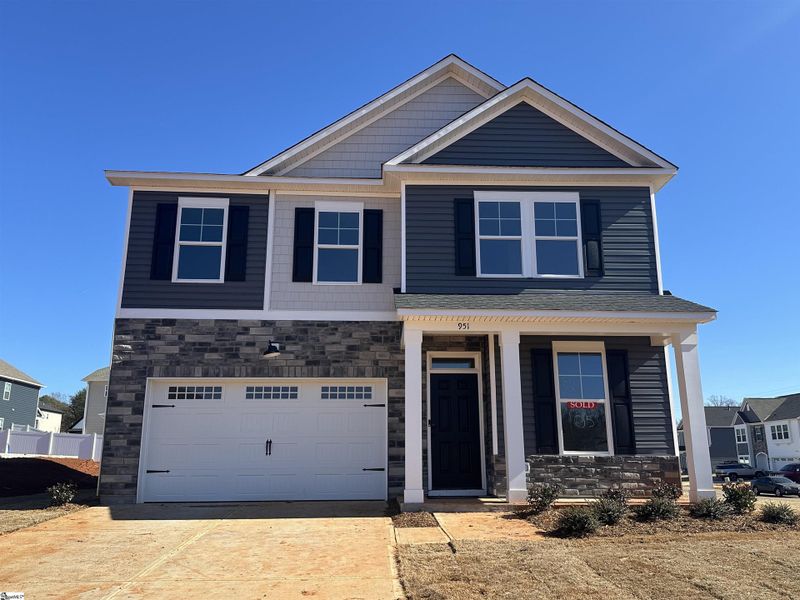 Front exterior of a new home in Shiloh Trail, Wellford, SC, highlighting curb appeal (Image 1). Front exterior of a new home in Shiloh Trail, Wellford, SC, highlighting curb appeal (Image 1).