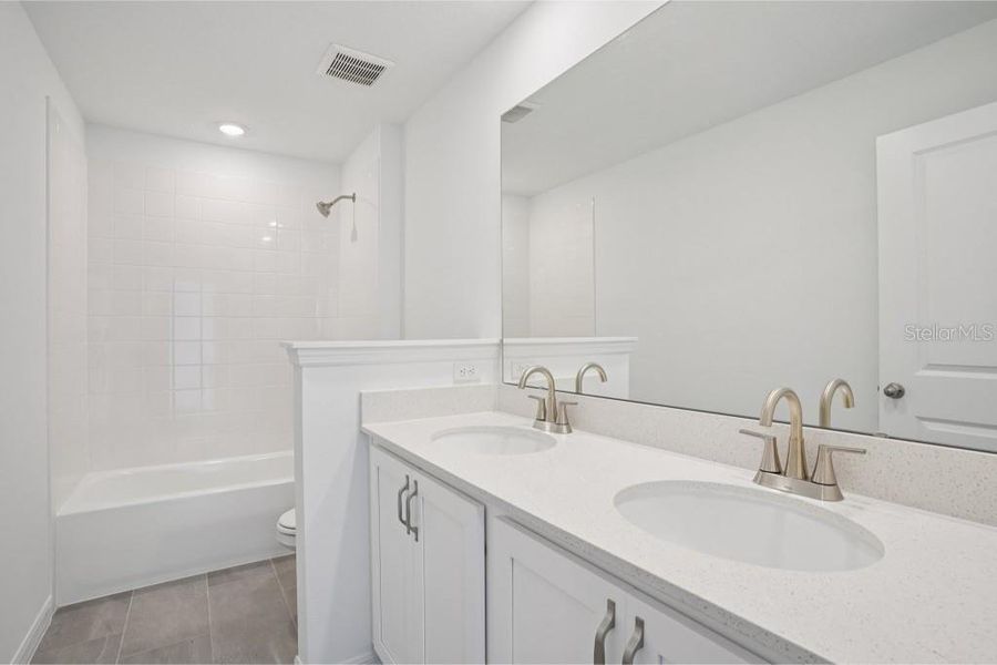Furnished interior view inside a new home in Ardisia Park Traditional, New Smyrna Beach (Image 6).