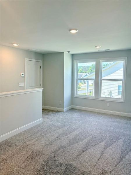 Spacious, unfurnished interior of a new home in Heritage Pointe at The Georgian, Villa Rica (Image 12).