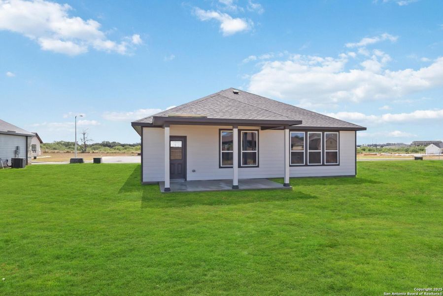 Front exterior of a new home in Bonita Vista, Pleasanton, TX, highlighting curb appeal (Image 18). Front exterior of a new home in Bonita Vista, Pleasanton, TX, highlighting curb appeal (Image 18).