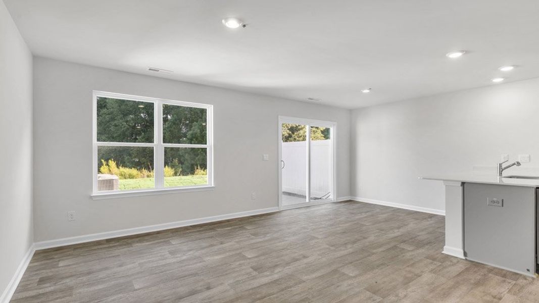 Spacious, unfurnished interior of a new home in The Townes at Honeycutt Oaks, Angier (Image 8). Spacious, unfurnished interior of a new home in The Townes at Honeycutt Oaks, Angier (Image 8).