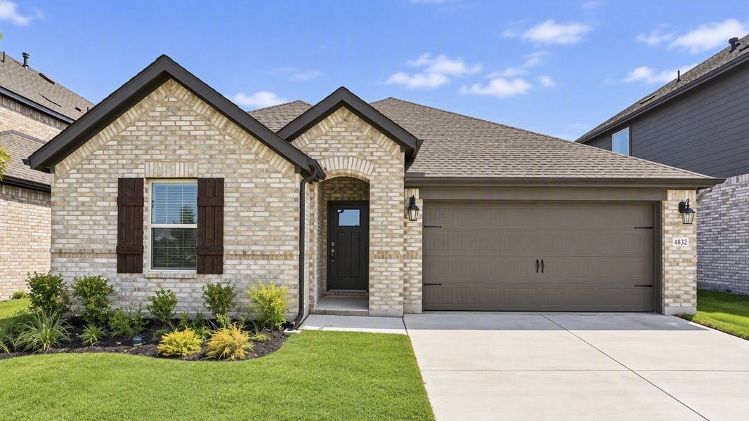 Front exterior of a new home in Silverado, Aubrey, TX, highlighting curb appeal (Image 1). Front exterior of a new home in Silverado, Aubrey, TX, highlighting curb appeal (Image 1).