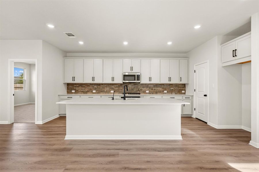 Furnished interior view inside a new home in Berry Creek Highlands, Georgetown (Image 9).