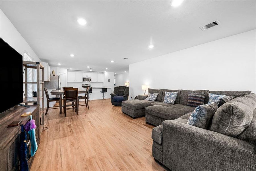 Large family room open to the kitchen.