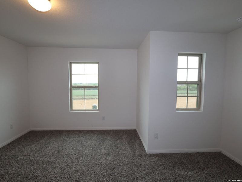 Spacious, unfurnished interior of a new home in Mesquite Ridge, San Antonio (Image 22).