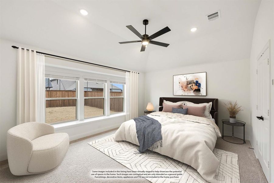 Bedroom with ceiling fan, large windows, carpet flooring, and a queen-sized bed with neutral bedding Bedroom with ceiling fan, large windows, carpet flooring, and a queen-sized bed with neutral bedding