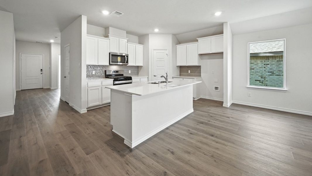 Furnished interior view inside a new home in Liberty Crossing, Royse City (Image 8).
