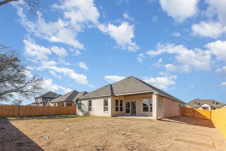 Front exterior of a new home in Cole Crossing Estates, DeSoto, TX, highlighting curb appeal (Image 22).