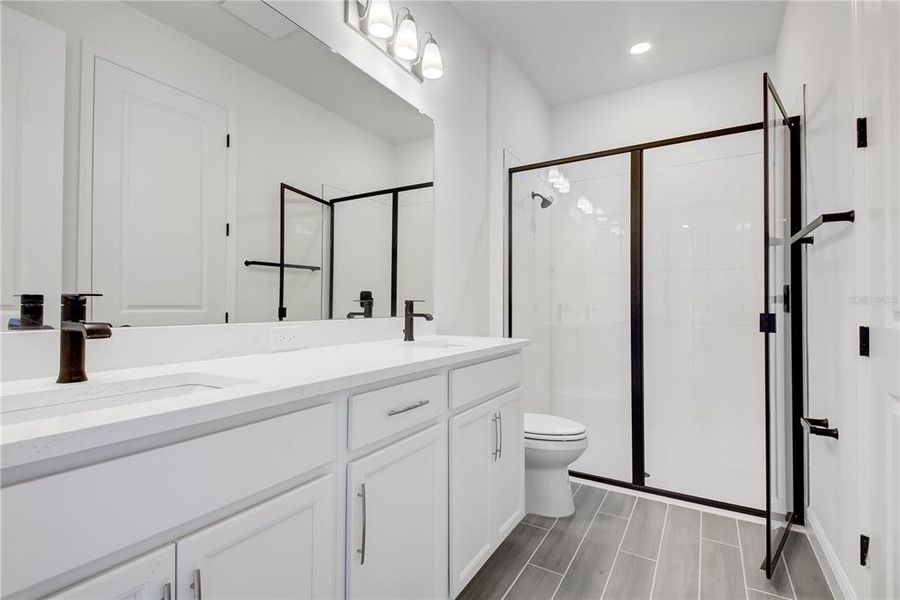 Furnished interior view inside a new home in Bungalow Walk at Lakewood Ranch, Lakewood Ranch (Image 13).