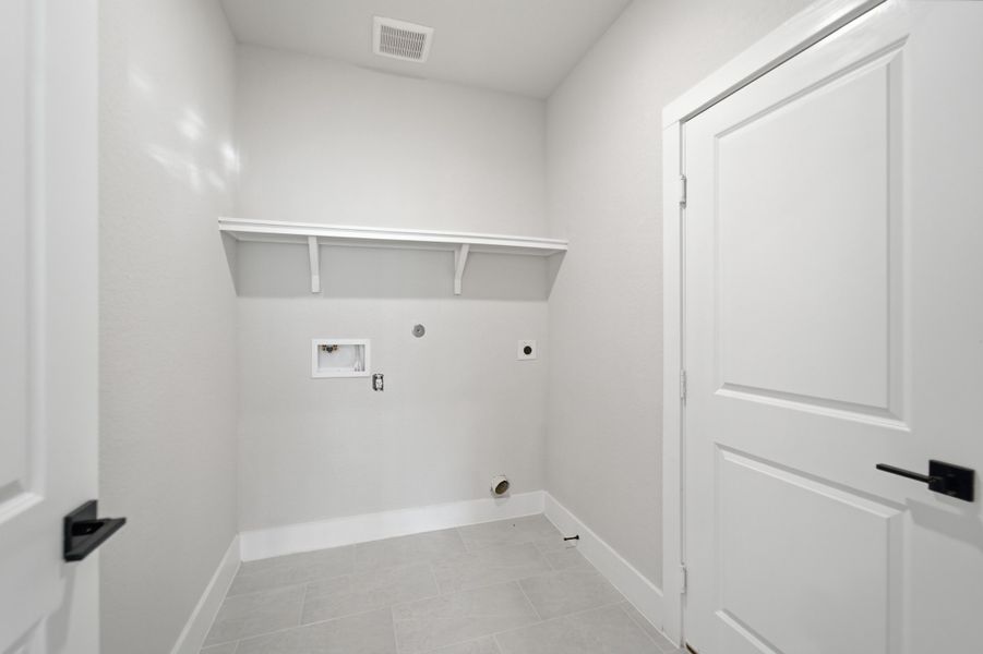Spacious, unfurnished interior of a new home in The Woodlands at Medina Hills, Mico (Image 22).