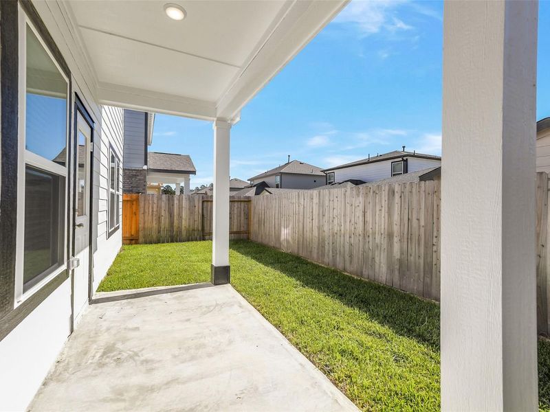 Exterior details and patio area of a home in Lakes at Black Oak, Magnolia (Image 17). Exterior details and patio area of a home in Lakes at Black Oak, Magnolia (Image 17).