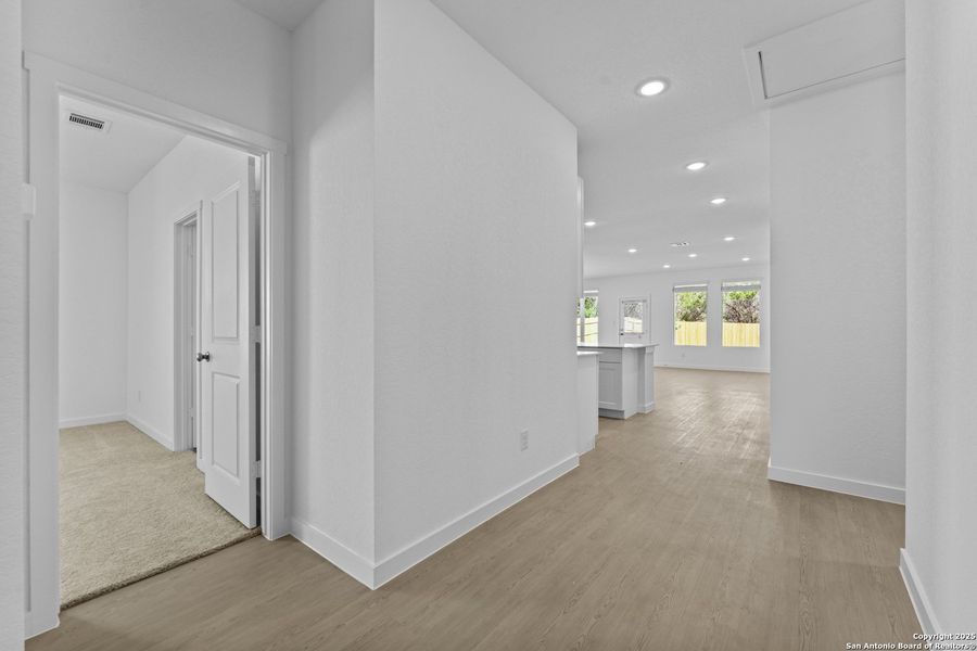 Spacious, unfurnished interior of a new home in Waterwheel: Coastline Collection, San Antonio (Image 14).