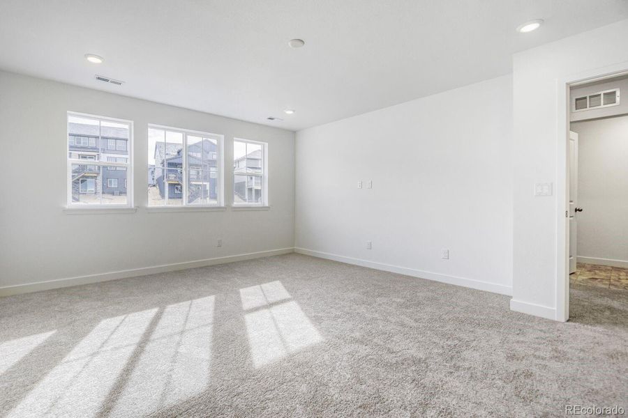Spacious, unfurnished interior of a new home in Newlin Crossing, Parker (Image 11).