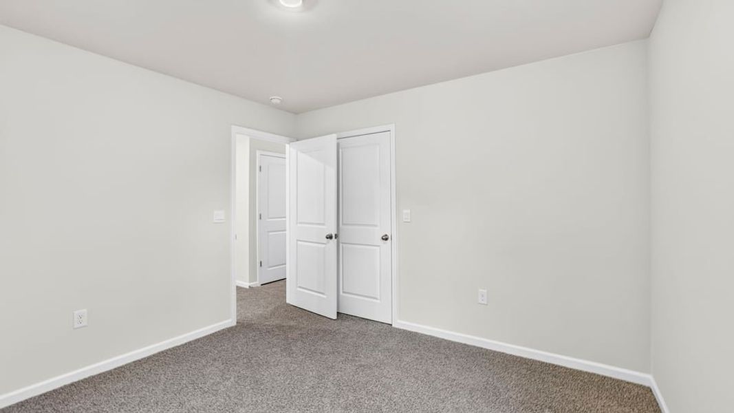 Spacious, unfurnished interior of a new home in Gibson Grove, Laurens (Image 27).
