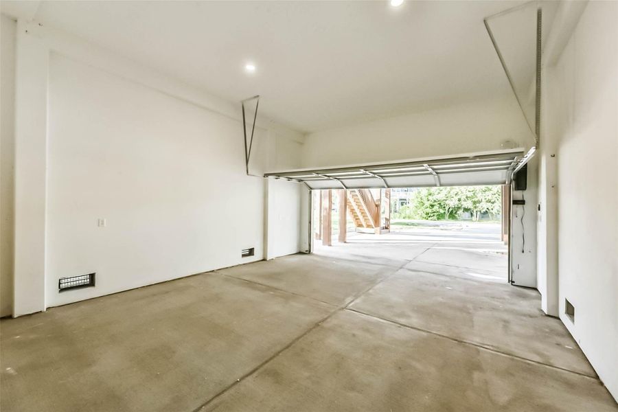 The two-car garage is an added bonus, perfect for extra storage or even a party room for events!