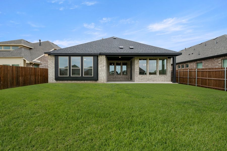 Exterior details and patio area of a home in Panchasarp Farms, Burleson (Image 4).