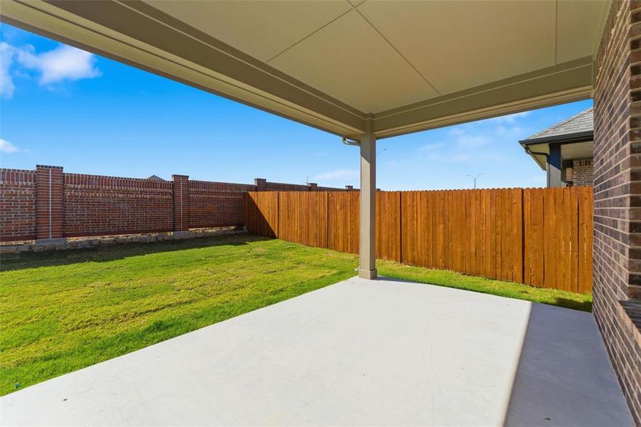 Exterior details and patio area of a home in Northstar, Haslet (Image 29).
