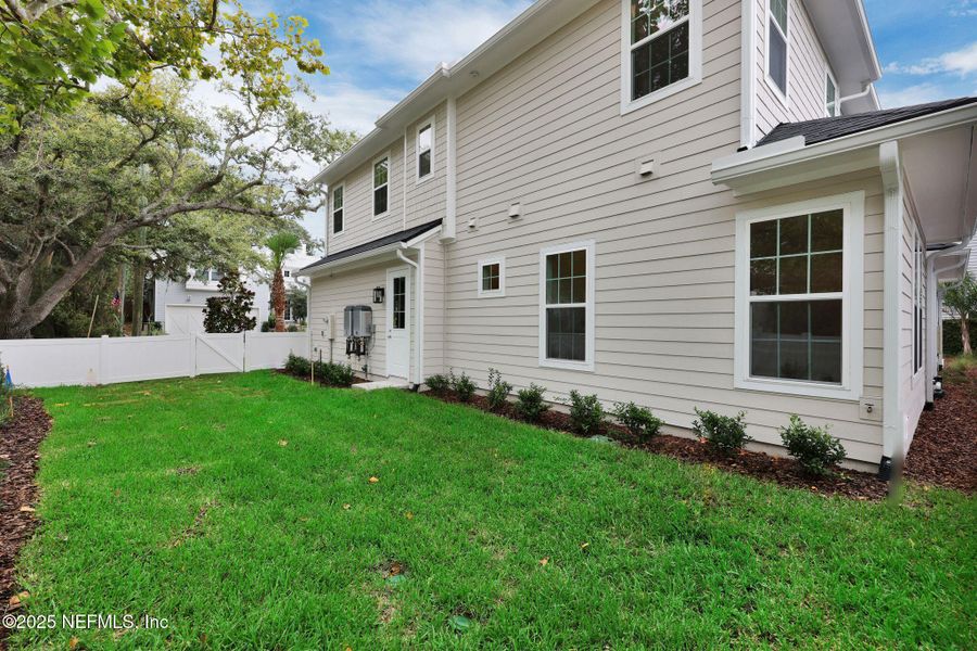 Front exterior of a new home in , Atlantic Beach, FL, highlighting curb appeal (Image 25). Front exterior of a new home in , Atlantic Beach, FL, highlighting curb appeal (Image 25).