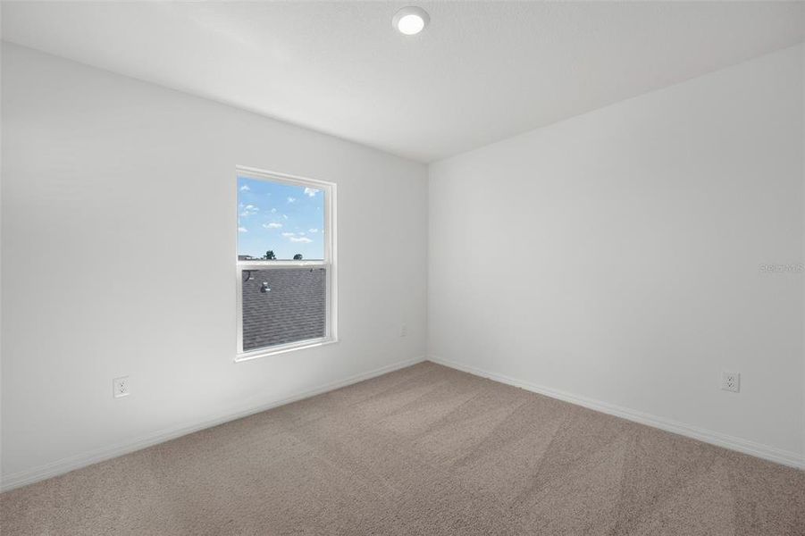 Spacious, unfurnished interior of a new home in Peach Crossings, Winter Haven (Image 20).