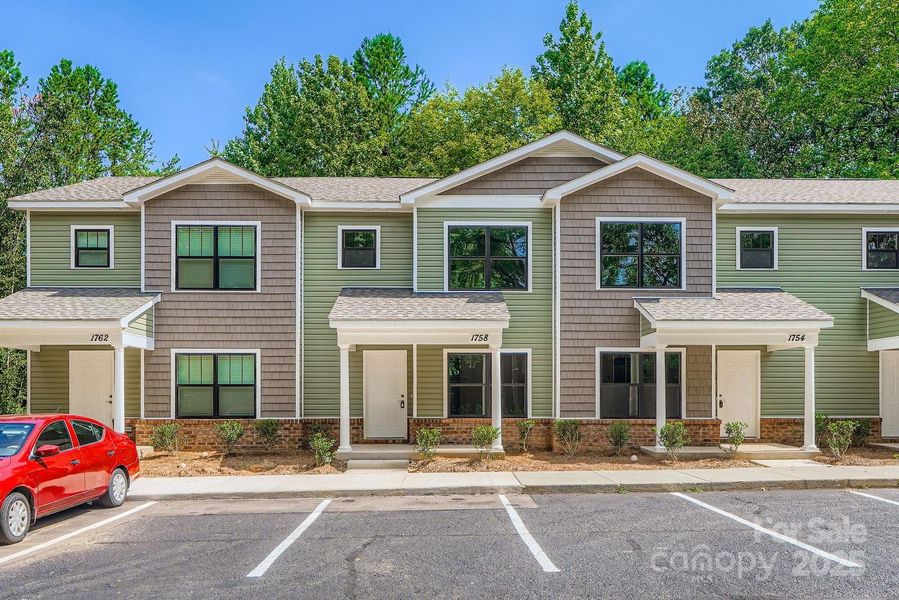 Front exterior of a new home in , Charlotte, NC, highlighting curb appeal (Image 18). Front exterior of a new home in , Charlotte, NC, highlighting curb appeal (Image 18).