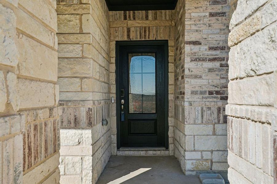 Exterior details and patio area of a home in Stonehaven, Seagoville (Image 4).
