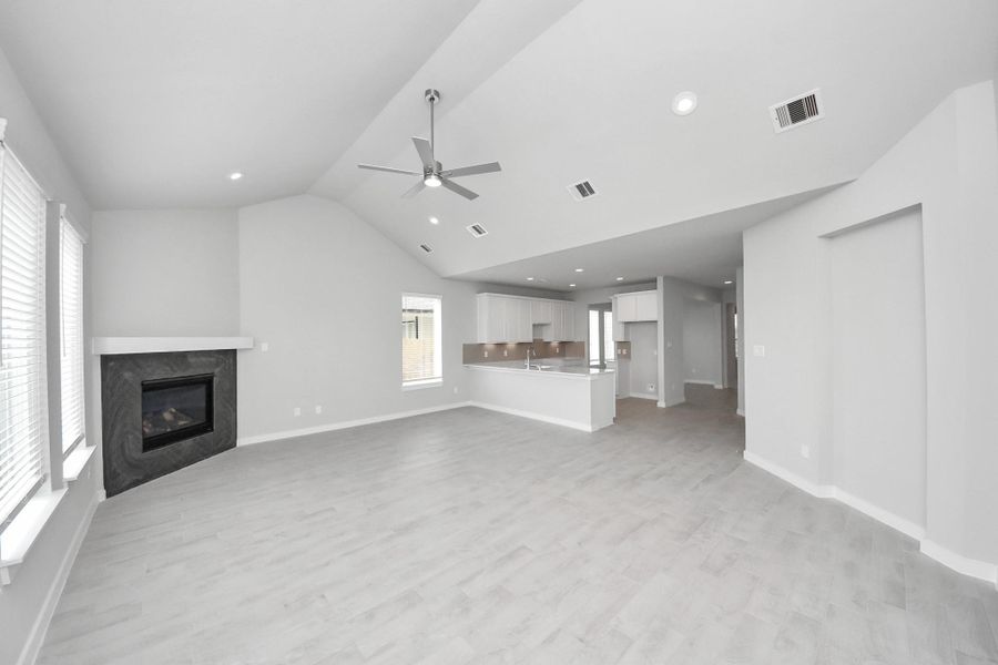 Take another glimpse into the heart of the home with this additional view of the family room—a sprawling space ready to accommodate all your gatherings. Sample photo of completed home with similar floor plan. Actual colors and selections may vary. Take another glimpse into the heart of the home with this additional view of the family room—a sprawling space ready to accommodate all your gatherings. Sample photo of completed home with similar floor plan. Actual colors and selections may vary.