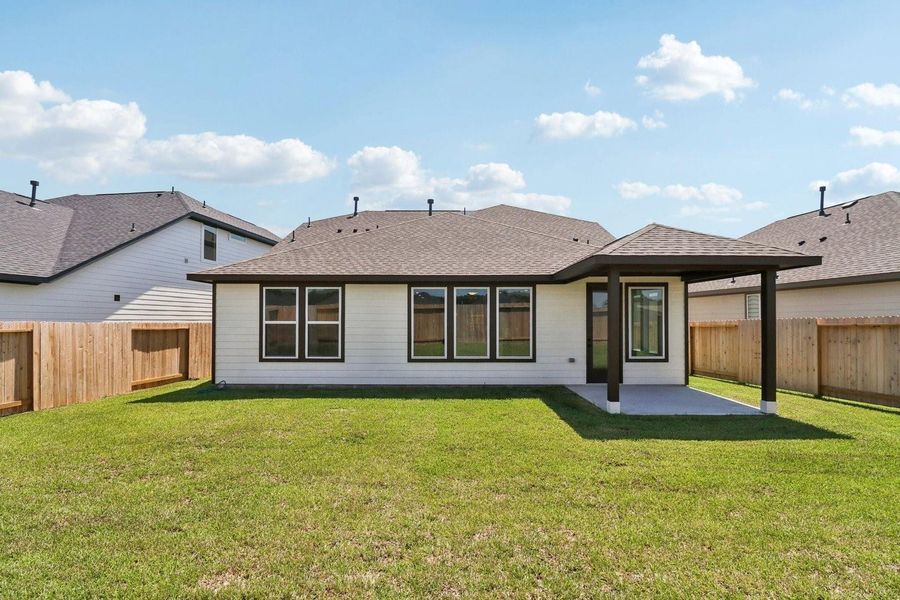 Backyard with extended covered patio Backyard with extended covered patio