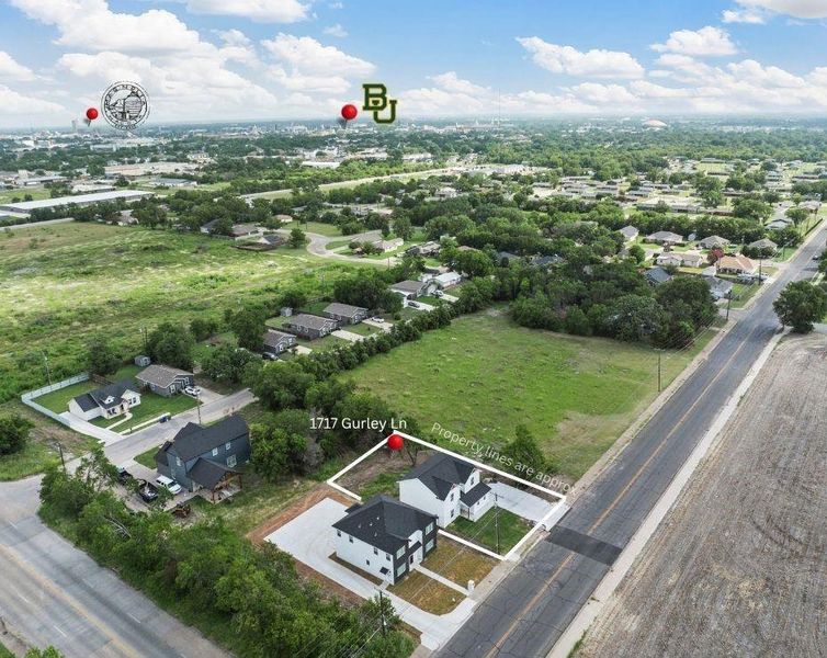 Aerial view of residential area with property parcel outlined Aerial view of residential area with property parcel outlined