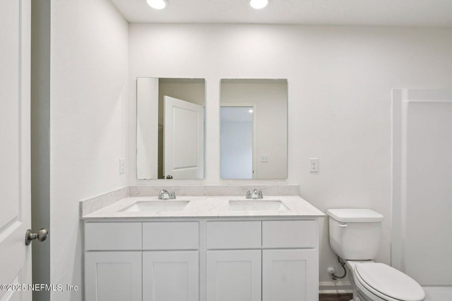 Furnished interior view inside a new home in Kings Landing, Jacksonville (Image 10).