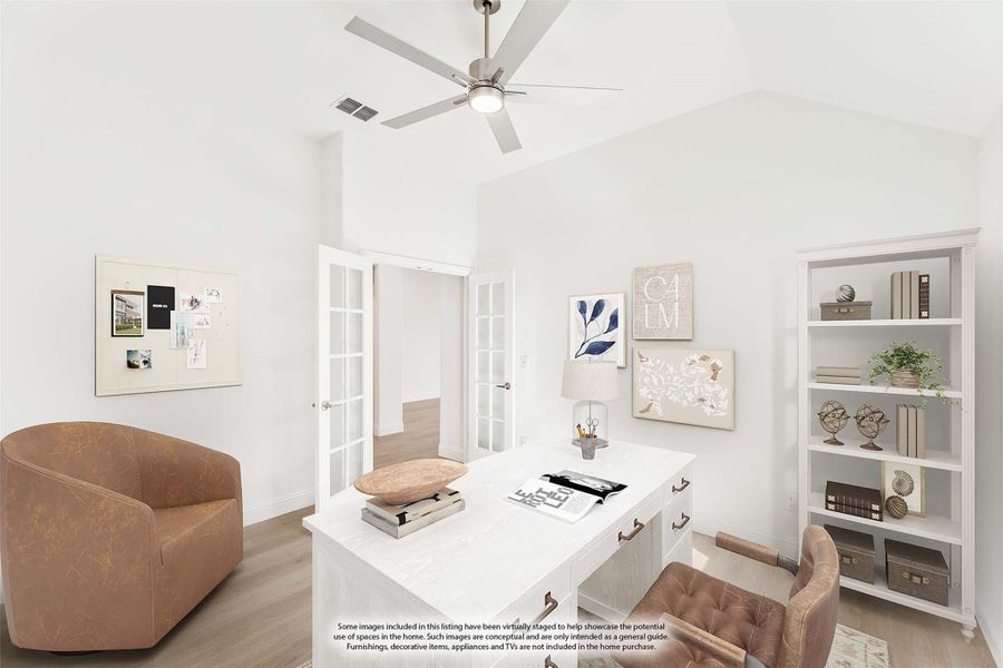 Home office with vaulted ceiling, white desk, ceiling fan, bookshelf, and French doors leading to hallway Home office with vaulted ceiling, white desk, ceiling fan, bookshelf, and French doors leading to hallway