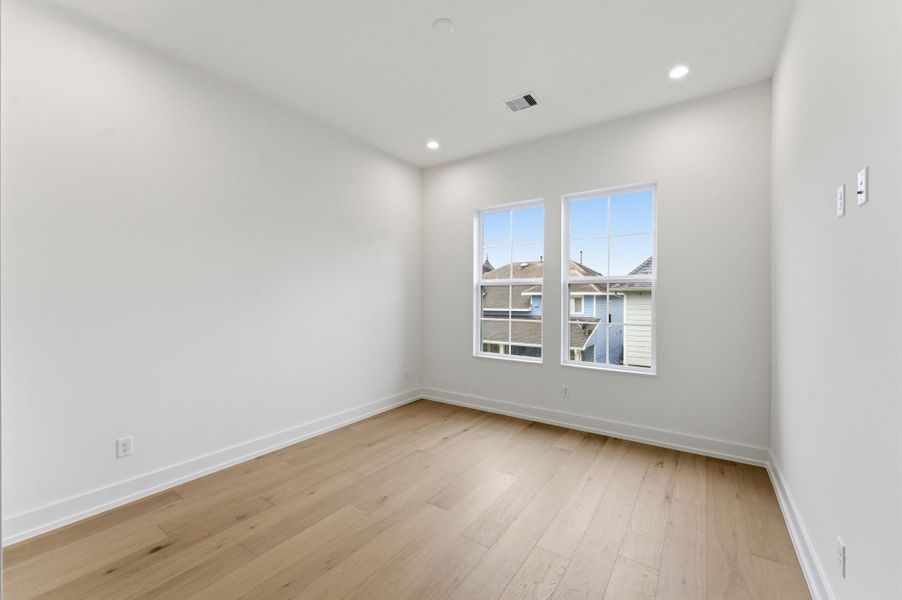 Secondary upstairs bedroom.