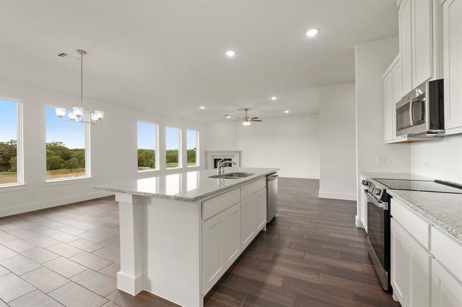Furnished interior view inside a new home in Saddleback Estates, Boyd (Image 3).