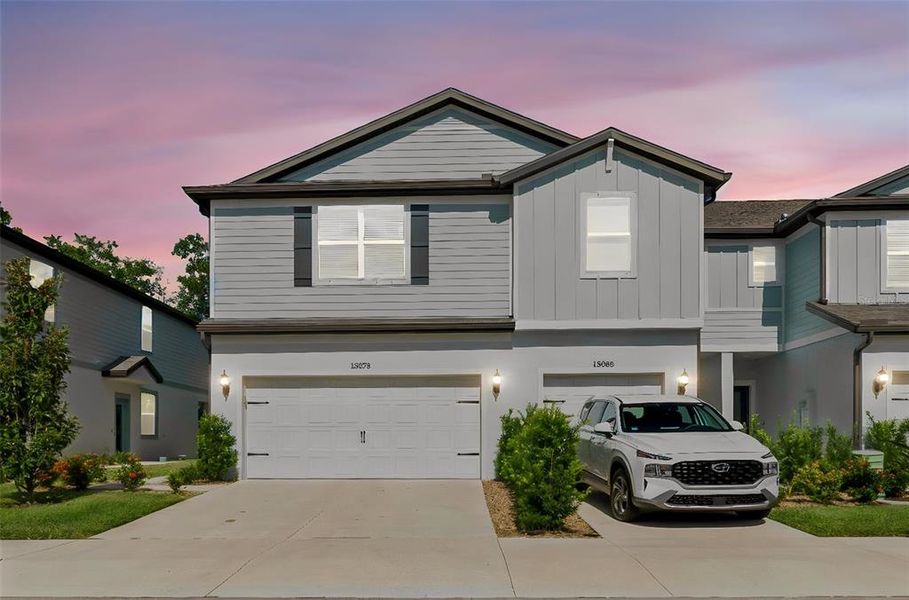 Front exterior of a new home in , Tampa, FL, highlighting curb appeal (Image 24).
