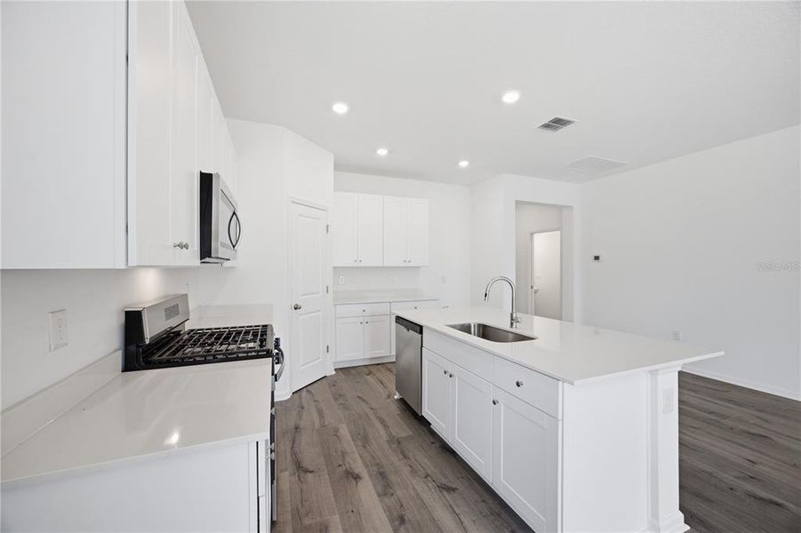 Furnished interior view inside a new home in , Okahumpka (Image 6).