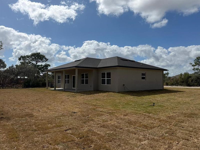 Exterior details and patio area of a home in , Sebring (Image 26).