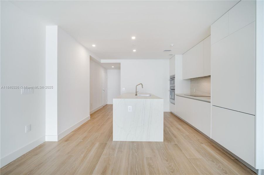 Furnished interior view inside a new home in Aria Reserve, Miami (Image 6). Furnished interior view inside a new home in Aria Reserve, Miami (Image 6).