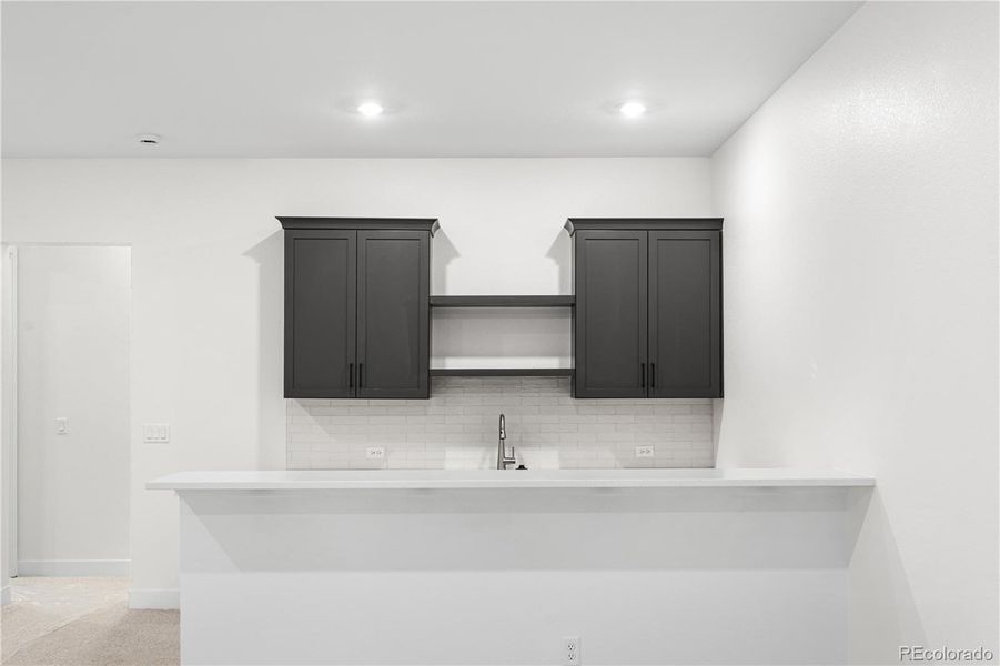 Furnished interior view inside a new home in Reflection at Solstice, Littleton (Image 12).