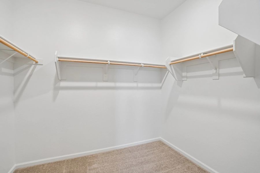 Primary walk in closet Primary walk in closet