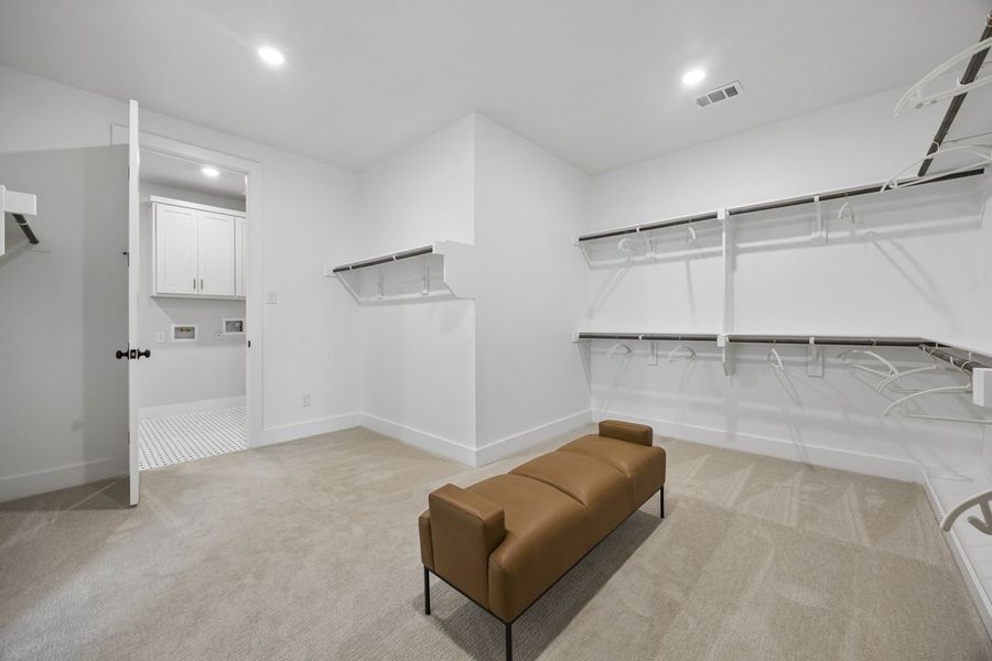 Representative furnished interior of a home built from the The Milan by Lillian Custom Homes in Polo Ridge, Forney (Image 34).